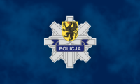 Zdjęcie poglądowe przedstawiające odznakę policyjną na niebieskim tle